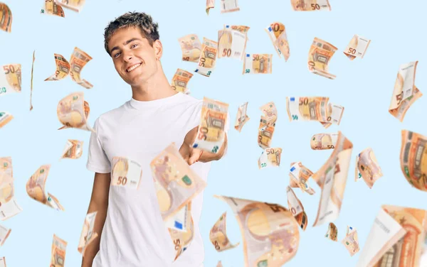 Young Handsome Man Wearing Casual White Tshirt Smiling Cheerful Offering — Stock Photo, Image