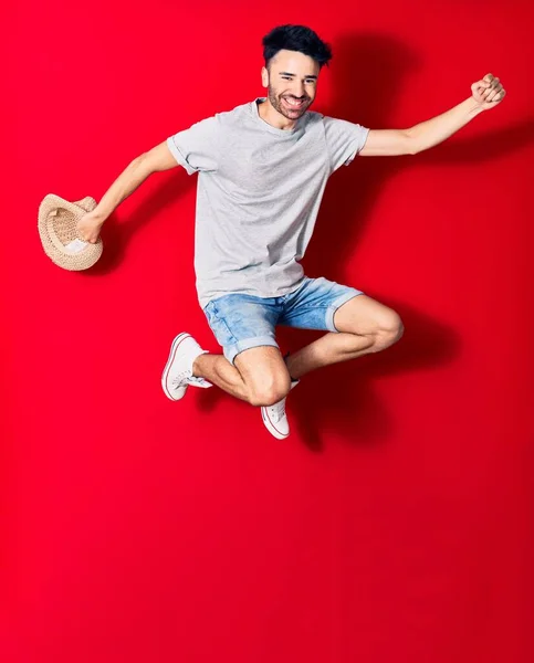 Young Handsome Hispanic Man Wearing Casual Clothes Smiling Happy Jumping — Stock Photo, Image