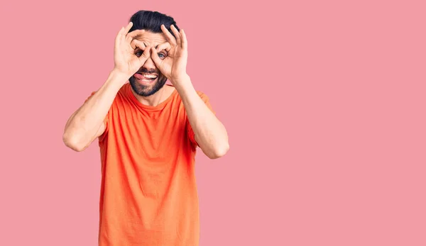 Young Handsome Man Beard Wearing Casual Shirt Doing Gesture Binoculars — Stock Photo, Image