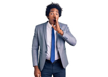 Yakışıklı, afro saçlı, iş ceketi giyen, el pençe divan duran, kötü niyetli konuşmalar fısıldayan afro-amerikalı adam. 