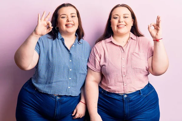 Young Size Twins Wearing Casual Clothes Smiling Positive Doing Sign — Stock Photo, Image