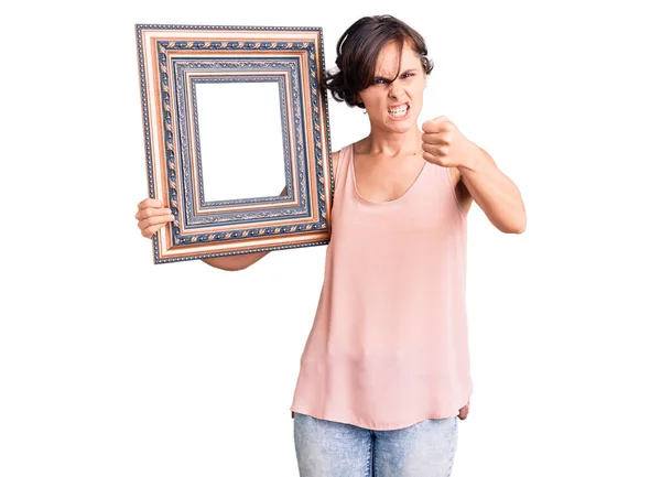 Beautiful Young Woman Short Hair Holding Empty Frame Annoyed Frustrated — Stock Photo, Image