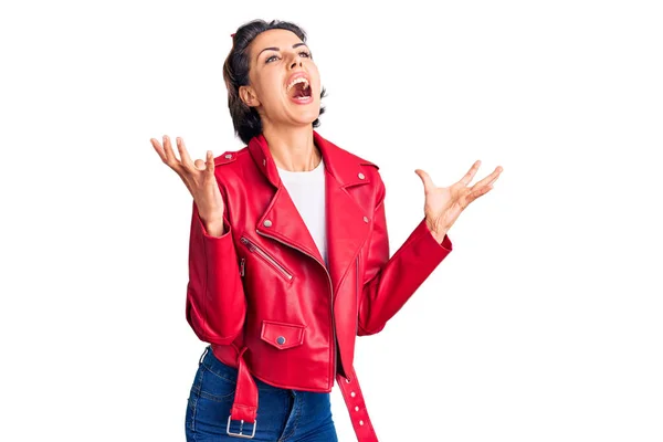 Young Beautiful Woman Wearing Red Leather Jacket Crazy Mad Shouting — Stock Photo, Image