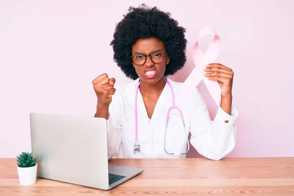 Young African American Woman Wearing Doctor Uniform Holding Pink Cancer — Stock Photo, Image
