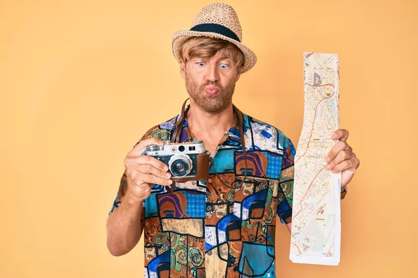 Young Blond Man Holding Vintage Camera City Map Making Fish — Stock Photo, Image
