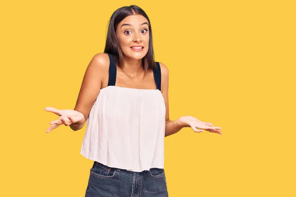 Young Hispanic Woman Wearing Casual Clothes Clueless Confused Expression Arms — Stock Photo, Image