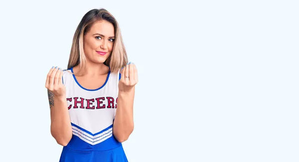 Giovane Bella Donna Bionda Indossa Uniforme Cheerleader Facendo Gesto Soldi — Foto Stock