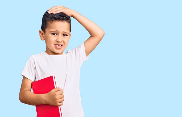 Petit Garçon Mignon Lisant Livre Stressé Frustré Avec Main Sur — Photo