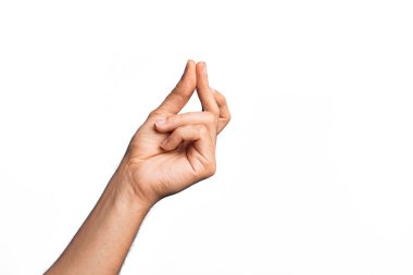Hand of caucasian young man showing fingers over isolated white background snapping fingers for success, easy and click symbol gesture with hand clipart