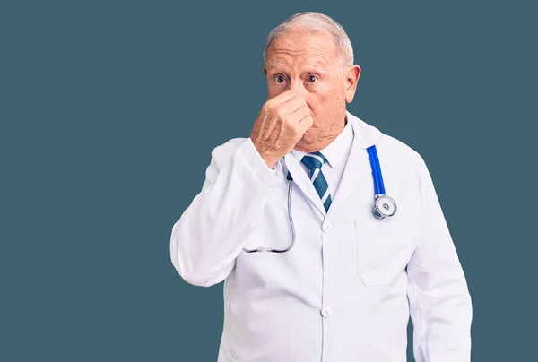 Senior Handsome Grey Haired Man Wearing Doctor Coat Stethoscope Smelling — Stock Photo, Image