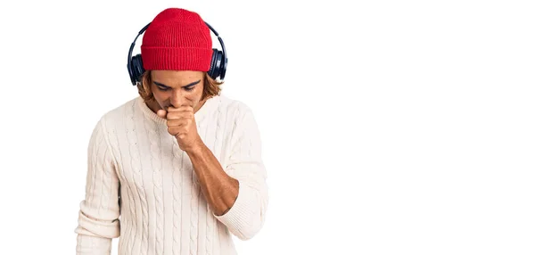 Young Hispanic Man Listening Music Using Headphones Feeling Unwell Coughing — Stock Photo, Image