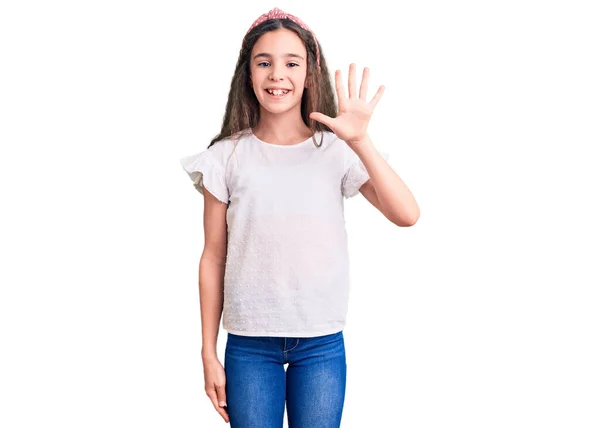 Cute Hispanic Child Girl Wearing Casual White Tshirt Showing Pointing — Stock Photo, Image