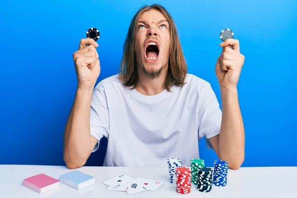 Handsome Caucasian Man Long Hair Playing Poker Holding Casino Chips — Stock Photo, Image