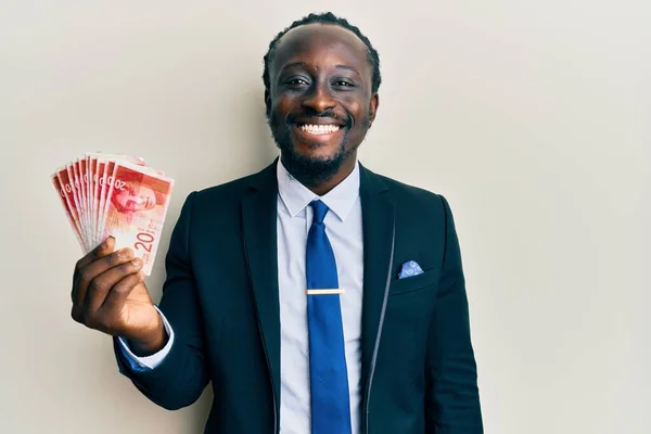 Handsome Young Black Man Wearing Business Suit Holding Shekels Banknotes — Stock Photo, Image