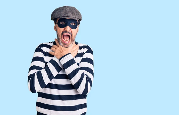 Middle Age Handsome Man Wearing Burglar Mask Shouting Suffocate Because — Stock Photo, Image