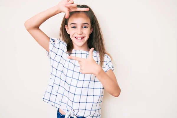 Cute Hispanic Child Girl Wearing Casual Clothes Smiling Making Frame — Stock Photo, Image