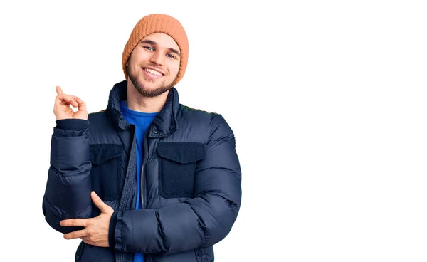 Young Handsome Man Wearing Winter Clothes Smiling Happy Pointing Hand — Stock Photo, Image