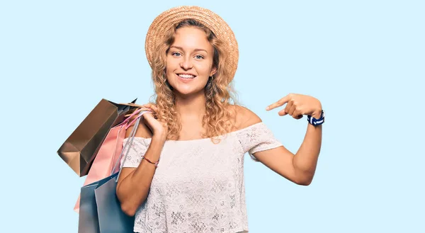 Beautiful Caucasian Woman Holding Shopping Bags Pointing Finger One Self — Stock Photo, Image