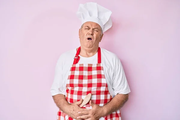 Senior Grey Haired Man Wearing Professional Baker Apron Hand Stomach — Stock Photo, Image