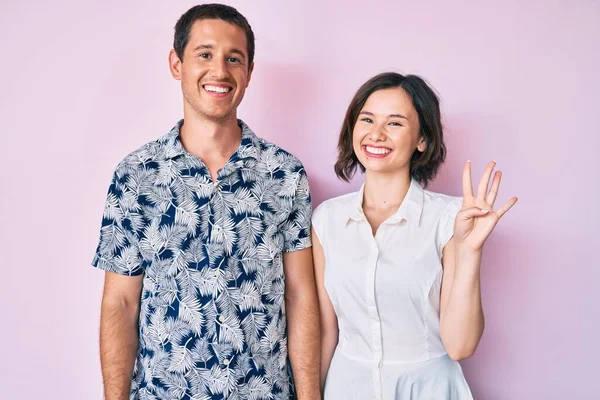 Belo Casal Vestindo Roupas Casuais Mostrando Apontando Para Cima Com — Fotografia de Stock