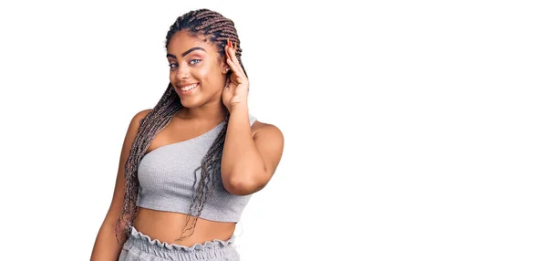 Young African American Woman Braids Wearing Sportswear Smiling Hand Ear — Stock Photo, Image