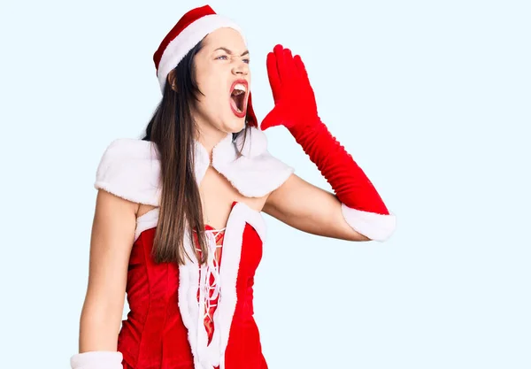 Genç Beyaz Kadın Noel Baba Kostümü Giyip Ele Tutuşarak Bağırıyor — Stok fotoğraf