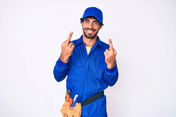 Handsome Young Man Curly Hair Bear Weaing Handyman Uniform Showing — стоковое фото