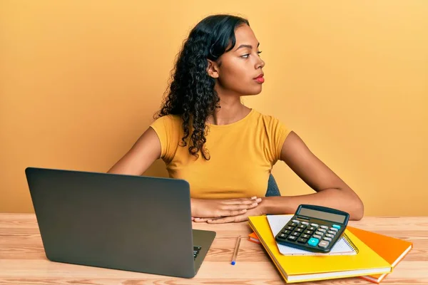 Young African American Girl Working Office Laptop Calculator Looking Side — Stock Photo, Image