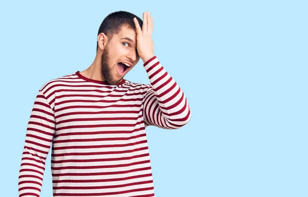 Young Handsome Man Wearing Striped Sweater Surprised Hand Head Mistake — Stock Photo, Image