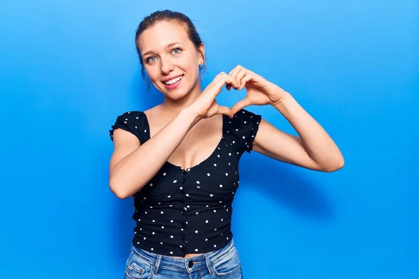 Young Blonde Woman Wearing Casual Clothes Smiling Love Doing Heart — Stock Photo, Image