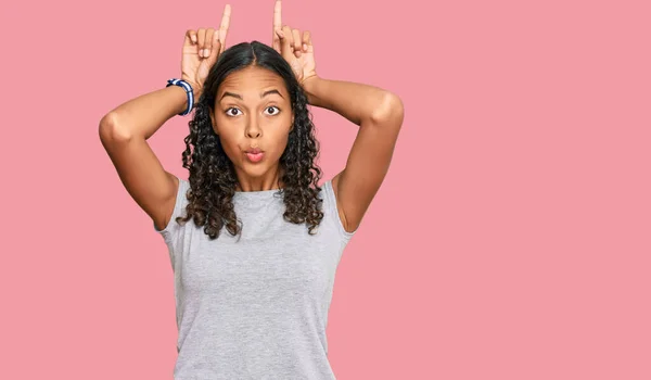 Young African American Girl Wearing Casual Clothes Doing Funny Gesture — Stock Photo, Image