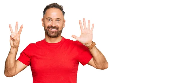 Handsome Middle Age Man Wearing Casual Red Tshirt Showing Pointing — Stock Photo, Image