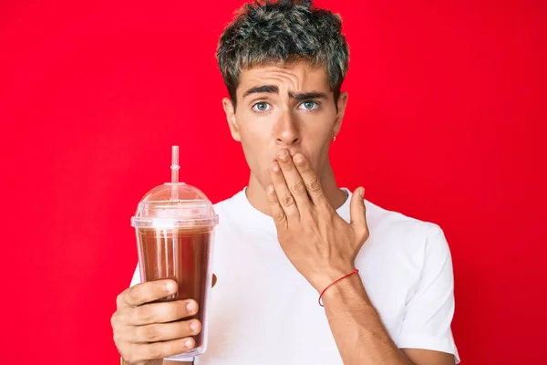 Young Handsome Man Holding Glass Smoothie Covering Mouth Hand Shocked — Stock Photo, Image