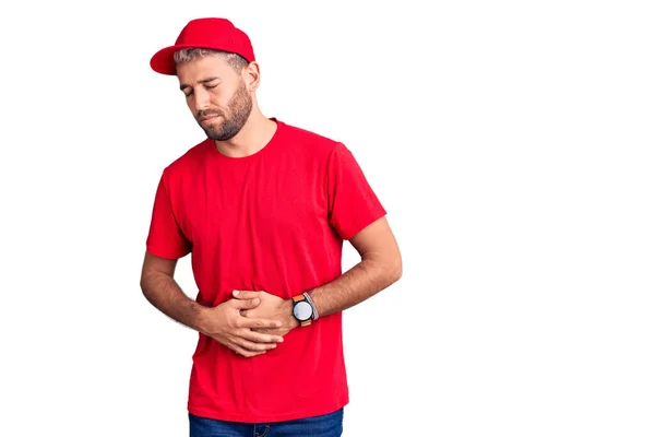 Joven Hombre Rubio Guapo Usando Camiseta Gorra Con Mano Estómago — Foto de Stock