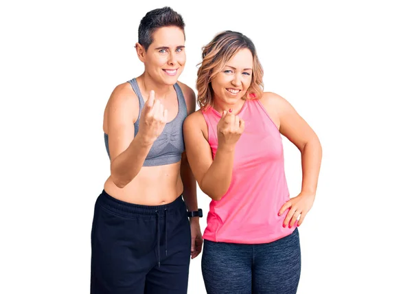 Couple Women Wearing Sportswear Beckoning Come Here Gesture Hand Inviting — Stock Photo, Image