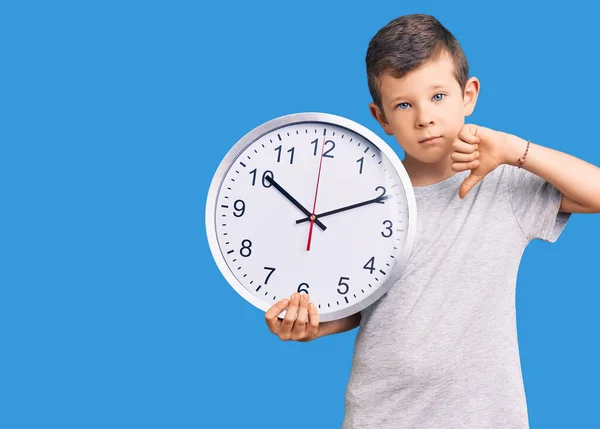 Cute Blond Kid Holding Big Clock Angry Face Negative Sign — Stock Photo, Image