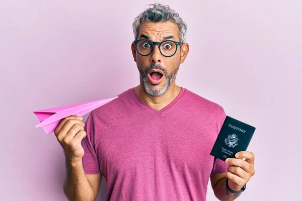 Middle Age Grey Haired Man Holding Paper Plane Passport Afraid — Stock Photo, Image