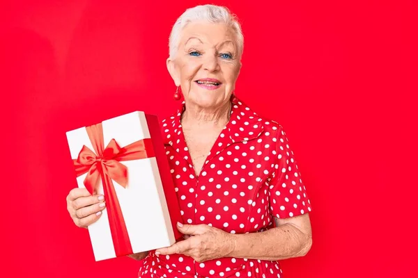 Senior Beautiful Woman Blue Eyes Grey Hair Holding Gift Looking — Stock Photo, Image