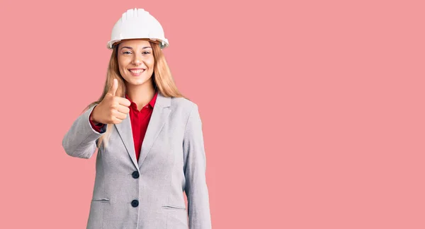 Beautiful Young Woman Wearing Architect Hardhat Doing Happy Thumbs Gesture — Stock Photo, Image