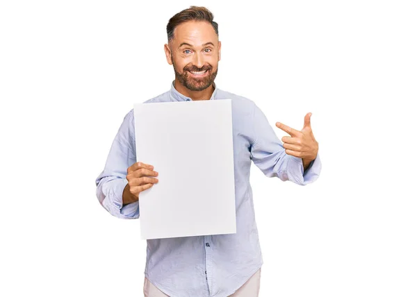 Handsome Middle Age Man Holding Blank Empty Banner Smiling Happy — Stock Photo, Image