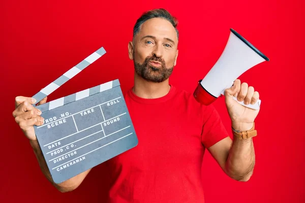 Handsome Middle Age Man Holding Video Film Clapboard Megaphone Looking — Stock Photo, Image