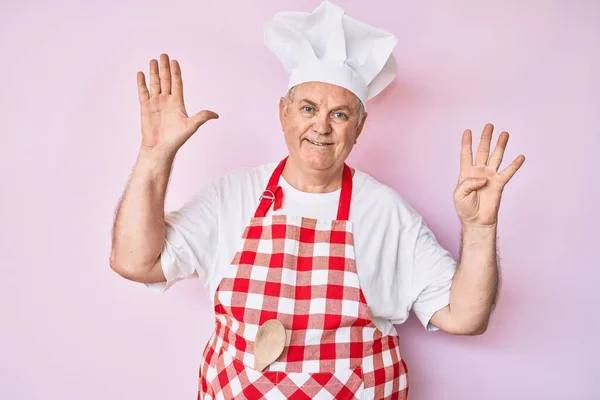 Senior Grey Haired Man Wearing Professional Baker Apron Showing Pointing — Stock Photo, Image