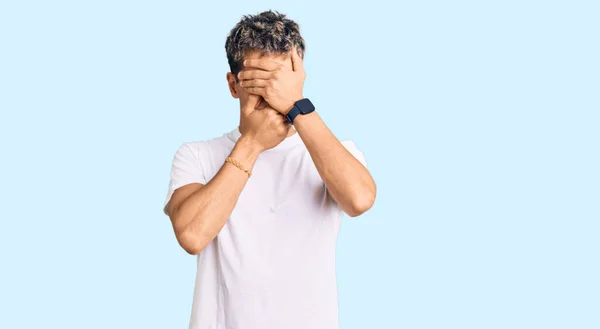 Young Handsome Man Wearing Casual White Tshirt Covering Eyes Mouth — Stock Photo, Image
