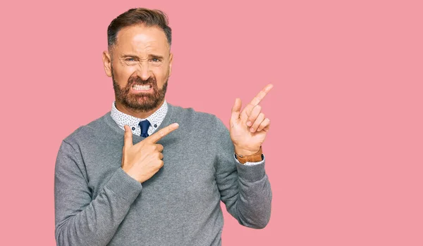 Handsome Middle Age Man Wearing Business Clothes Pointing Aside Worried — Stock Photo, Image