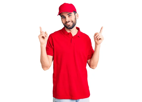 Young Handsome Man Beard Wearing Delivery Uniform Smiling Confident Pointing — Stock Photo, Image