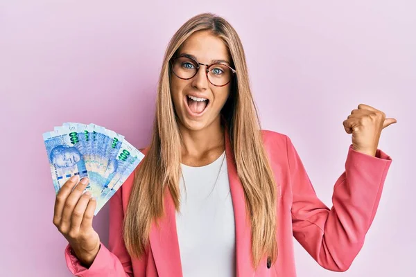 Young Blonde Woman Wearing Business Style Holding South African Rands — Stock Photo, Image