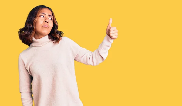 Young Beautiful Mixed Race Woman Wearing Winter Turtleneck Sweater Looking — Stock Photo, Image