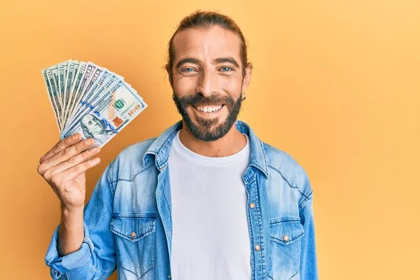 Attractive Man Long Hair Beard Holding Dollars Looking Positive Happy — Stock Photo, Image