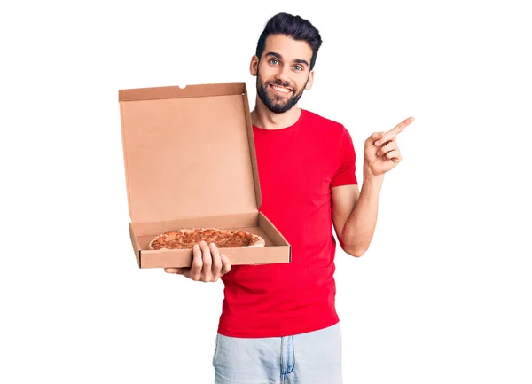 Young Handsome Man Beard Holding Delivery Cardboard Italian Pizza Smiling — Stock Photo, Image