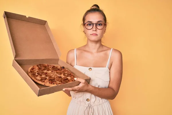 Beautiful Caucasian Woman Holding Tasty Pepperoni Pizza Relaxed Serious Expression — Stock Photo, Image